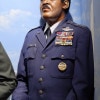 A statue of a confident black man in the dress blue uniform of the U.S. Air Force with rank insignia indicating that he is a 4-star general and enough ribbons to make  you worry that the weight of them will damage his jacket.